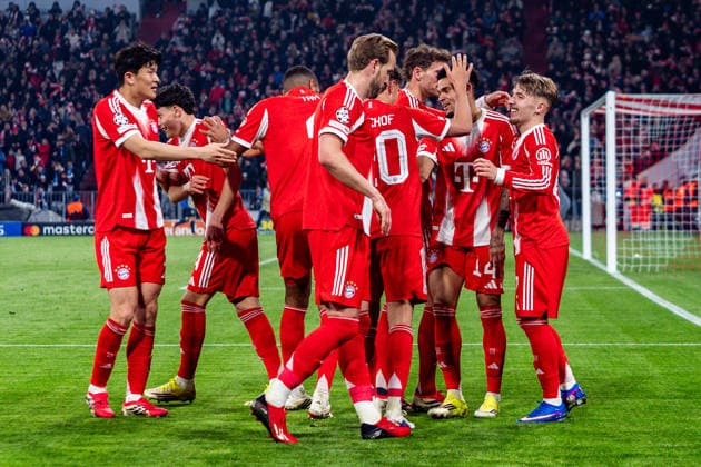 18 03 2026, FC Bayern München vs Atalanta Bergamo, UEFA Champions League, Round of 16 second leg goal for 3 0 by Lennart Karl FC Bayern Muenchen, 42 in celebration with Tom Bischof FC Bayern Muenchen, 20 Regulations prohibit any use of photographs as image sequences and or quasi video Copyright: xBahhoxKarax