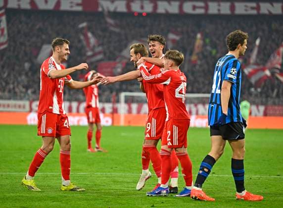 18 03 2026, Football UEFA Championsleague 2025 2026 Round of 16 second leg, FC Bayern Munich Atalanta Bergamo, in the Allianz Arena Munich, f l Josip Stanisic Bayern Munich , Harry Kane FC Bayern Munich , Tom Bischof Bayern Munich and Lennart Karl FC Bayern Munich Giorgio Scalvini Atalanta Bergamo DFL and DFB regulations prohibit any use of photographs as image sequences and or quasi video