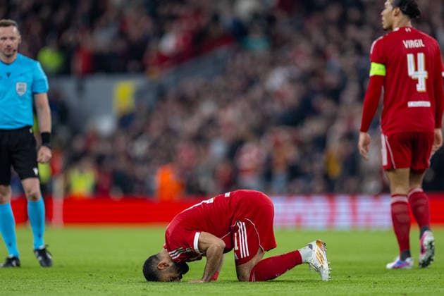 Football - UEFA Champions League - Round of 16 - 2nd Leg - Liverpool FC v Galatasaray A.Åž. LIVERPOOL, ENGLAND - Wednesday, March 18, 2026: Liverpool s Mohamed Salah kneels to pray as he celebrates after scoring the fourth (and 50th European) goal during the UEFA Champions League Round of 16 2nd Leg match between Liverpool FC and Galatasaray A.Åž. at Anfield. (Photo by David Rawcliffe Propaganda) LIVERPOOL Anfield MERSEYSIDE ENGLAND  Copyright: xDavidxRawcliffex P2026-03-18-Liverpool_Galatasaray-103