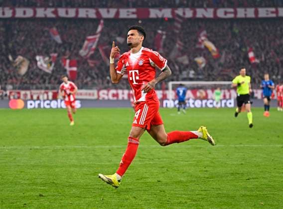 18 03 2026, Football UEFA Championsleague 2025 2026 Round of 16 second leg, FC Bayern Munich Atalanta Bergamo, in the Allianz Arena Munich, Luis Diaz FC Bayern Munich cheers DFL and DFB regulations prohibit any use of photographs as image sequences and or quasi video