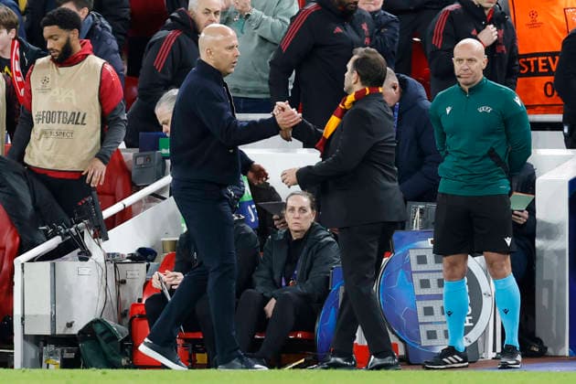 Liverpool, England, 18th March 2026. Arne Slot manager of Liverpool shakes hands with Sokan Buruk manager of Galatasaray after the Liverpool vs Galatasaray UEFA Champions League round of 16 match at Anfield, Liverpool. Picture credit should read: Cody Froggatt Sportimage EDITORIAL USE ONLY. No use with unauthorised audio, video, data, fixture lists, club league logos or live services. Online in-match use limited to 120 images, no video emulation. No use in betting, games or single club league player publications. SPI_075_CF_Liverpool_Galatasaray SPI-4618-0074