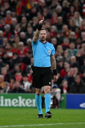 Liverpool v Galatasaray - UEFA Champions League LIVERPOOL, UNITED KINGDOM - MARCH 18: Referee Pawel Raczkowski makes a decision during the UEFA Champions League Round of 16 2nd leg match between Liverpool and Galatasaray at Anfield Stadium in Liverpool, United Kingdom, on March 18, 2026. Rasid Necati Aslim Anadolu Liverpool United Kingdom. Editorial use only. Please get in touch for any other usage.  Copyright: x2026xAnadoluxRasidxNecatixAslimx