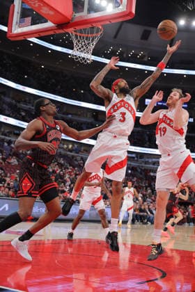 CHICAGO, IL - MARCH 18: Brandon Ingram 3 of the Toronto Raptors grabs a rebound over Jalen Smith 25 of the Chicago Bulls during the first half on March 18, 2026 at the United Center in Chicago, Illinois. (Photo by Melissa Tamez Icon Sportswire) NBA, Basketball Herren, USA MAR 18 Toronto Raptors at Chicago Bulls EDITORIAL USE ONLY Icon260318008
