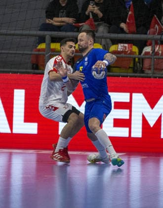 Turkiye v Romania - 2027 World Men s Handball Championship BOLU, TURKIYE - MARCH 19: Enis Harun Hacioglu (L) of Turkiye in action during the second round of the 2027 Men s World Handball Championship European Qualifiers between Turkiye and Romania at Bolu Karacayir Indoor Sports Hall in Bolu, Turkiye on March 19, 2026. Zafer Goder Anadolu Bolu Turkey. Editorial use only. Please get in touch for any other usage.  Copyright: x2026xAnadoluxZaferxGoderx