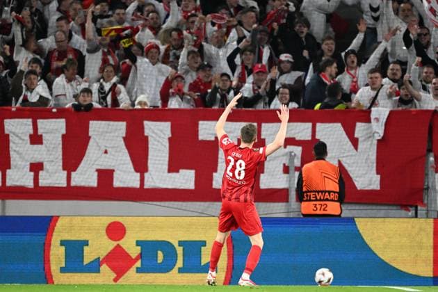 Freiburg s Matthias Ginter celebrates after scoring during a soccer game between German Club Freiburg and Belgian KRC Genk in Freiburg im Breisgau, Germany on Thursday 19 March 2026, the return leg of the 1 16 Finals of the UEFA Europa League tournament. Genk won the first leg 1-0. JILLxDELSAUX  x168211544x
