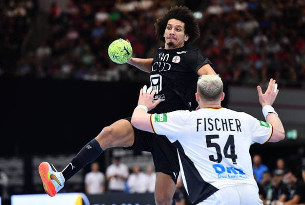 Handball international match Germany Egypt on 19 03 20226 in the Westfalenhalle in Dortmund Justus Fischer Germany , front Ali Zein Egypt , back North Rhine-Westphalia Germany
