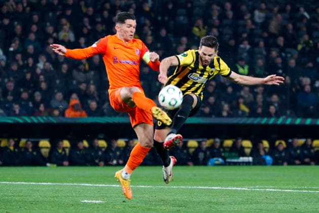 AEK Athens v NK Celje UEFA Europa League Mijat Gacinovic of AEK Athens and Juanjo Nieto of NK Celje during the UEFA Europa League Round of 16 Second Leg match at Allwyn Arena, Athens 19 03 2026 UK Newspapers OUT Copyright: xYannisxHalasx FIL-23160-0031