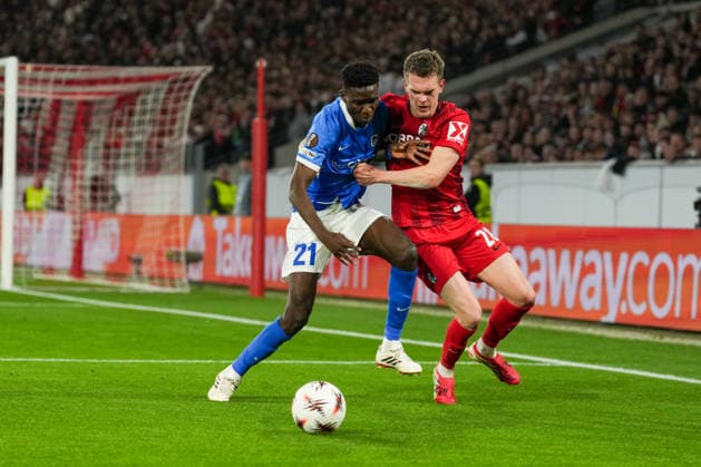 UEFA Europa League SC Freiburg vs KRC Genk, 19 03 2026 Duel between Ibrahima Bangoura KRC Genk, 21 and Matthias Ginter SC Freiburg, 28 UEFA Europa League SC Freiburg vs KRC Genk, Europa Park Stadion, 19 03 2026 Copyright: xBEAUTIFULxSPORTS Boscox