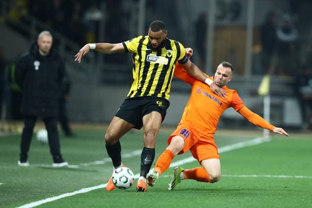 UEFA Conference League, AEK Athens vs vs Celje - Derek Kutesa of AEK Athens in action against Matej Poplatnik of Celje during the UEFA Conference League round of 16 second leg soccer match between AEK Athens and Celje, in Athens, Greece, 19 March 2026. IMAGO ONE INCH PRODUCTIONS ATHENS GREECE Copyright: xOnexInchxProductionsx 6899490