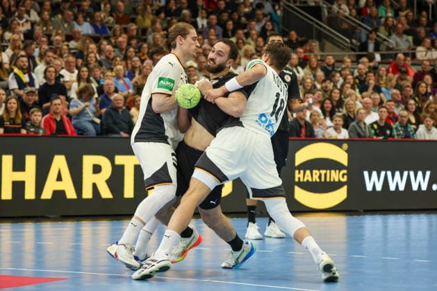 Dortmund, Germany March 19, 2026 Handball international friendly match Germany vs Egypt In the picture from left Juri Knorr Germany , Yasser Seif Egypt and Julian Köster Koester Germany Copyright: HMBxMedia MadeleinexFantini