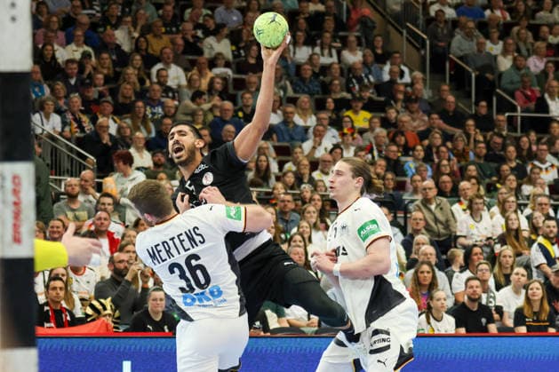 Dortmund, Germany March 19, 2026 Handball international friendly match Germany vs. Egypt In the picture from left Lukas Mertens Germany , Yehia Khaled Egypt , who scores a goal, and Juri Knorr Germany Copyright: HMBxMedia MadeleinexFantini