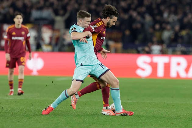 UEFA Europa League round of 16 second leg match AS Roma - Bologna Bologna s Scottish midfielder Lewis Ferguson challenges for the ball with Roma™s Spanish defender Mario Hermoso during UEFA Europa League round of 16 second leg match AS Roma - Bologna at Olimpico stadium on March 19, 2026 in Rome, Italy. _BPH8277 Copyright: xAntonioxBalascox
