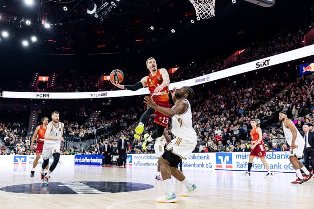 MUNICH, GERMANY - MARCH 19: Andreas Andi Obst (FC Bayern Muenchen, 13) shoots the ball over Mfiondu Kabengele (Dubai Basketball, 17) during the Turkish Airlines EuroLeague match between FC Bayern Muenchen vs.Dubai Basketball at SAP Garden on round 32 of Turkish Airlines EuroLeague on March 19, 2026 in Munich, Germany. Bavaria Germany Copyright: xSteffiexWunderlx