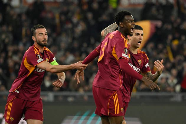 Roma™s Evan Ndicka celebrates after scoring the goal 1-1 during the Uefa Europa League soccer match between Roma and Bologna at the Olympic Stadium in Rome, Italy - Thursday, March 19, 2026. - Soccer .  Copyright: xFabrizioxCorradetti LaPressex