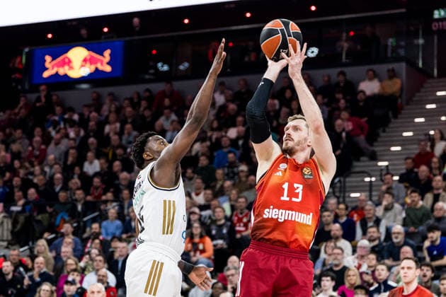 MUNICH, GERMANY - MARCH 19: Andreas Andi Obst (FC Bayern Muenchen, 13) shoots the ball against McKinley Wright IV (Dubai Basketball, 25) defending during the Turkish Airlines EuroLeague match between FC Bayern Muenchen vs.Dubai Basketball at SAP Garden on round 32 of Turkish Airlines EuroLeague on March 19, 2026 in Munich, Germany. Bavaria Germany Copyright: xSteffiexWunderlx