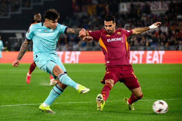 Santiago Castro of Bologna FC challenged by Zeki Celik of AS Roma during the UEFA Europa League 2025 2026 football match between AS Roma and Bologna FC 1909 at Stadio Olimpico in Roma (Italy), March 19, 2026. andreaxstaccioli
