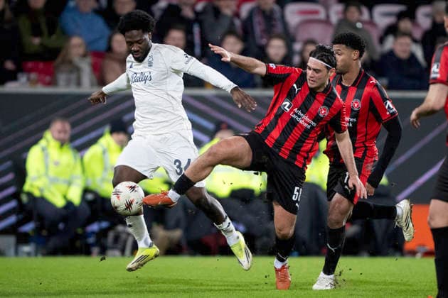 Europa League FC Midtjylland Nottingham Forest FC Midtjylland s Aral Simsir in action with Nottingham Forest s Ola Aina during the match between FC Midtjylland and Nottingham Forest in the Europa League 2nd match at MCH Arena in Herning on Thursday, March 19, 2026 Photo Bo Amstrup Ritzau Scanpix , Herning Denmark Mors  Copyright: BoxAmrstrupx xRitzauxScanpix BoxAmstrupx spdk20260319-221918-L