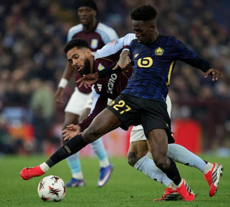 Aston Villa FC v Lille OSC - UEFA Europa League 2025 26 Round of 16 Second Leg Douglas Luiz of Aston Villa and Felix Correia of Lille OSC challenge during the UEFA Europa League 2025 26 Round of 16 Second Leg match between Aston Villa FC and Lille OSC at Villa Park on March 19, 2026 in Birmingham, England. WARNING! This Photograph May Only Be Used For Newspaper And Or Magazine Editorial Purposes. May Not Be Used For Publications Involving 1 player, 1 Club Or 1 Competition Without Written Authorisation From Football DataCo Ltd. For Any Queries, Please Contact Football DataCo Ltd on +44 (0) 207 864 9121 Birmingham Villa Park England United Kingdom Copyright: xAllstarxPicturexLibraryxLtdx