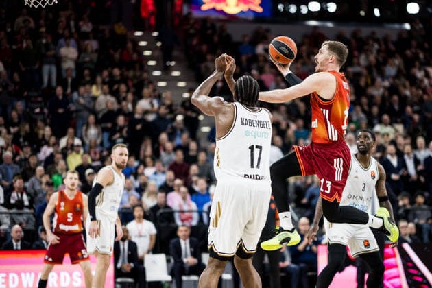 MUNICH, GERMANY - MARCH 19: Andreas Andi Obst (FC Bayern Muenchen, 13) tries to shoot the ball over Mfiondu Kabengele (Dubai Basketball, 17) during the Turkish Airlines EuroLeague match between FC Bayern Muenchen vs.Dubai Basketball at SAP Garden on round 32 of Turkish Airlines EuroLeague on March 19, 2026 in Munich, Germany. Bavaria Germany Copyright: xSteffiexWunderlx