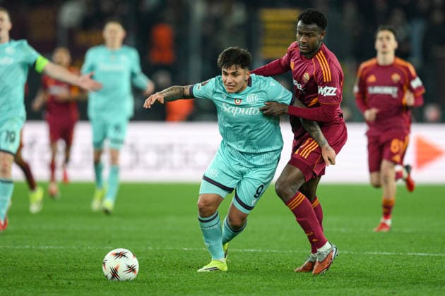 19th March 2026, Stadio Olimpico, Rome, Italy; UEFA Europa League Football; Roma versus Bologna; Evan Ndicka of AS Roma under pressure from Santiago Castro of Bologna FC  AllShotLive