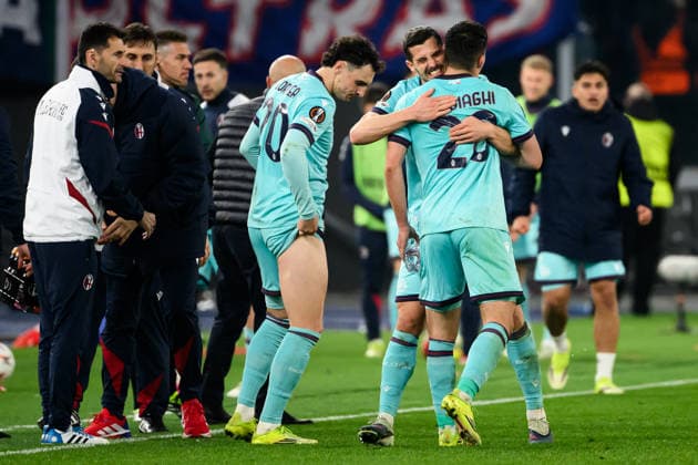 Nicolo Cambiaghi of Bologna FC celebrates with team mates after scoring the goal of 3-4 during the UEFA Europa League 2025 2026 football match between AS Roma and Bologna FC 1909 at Stadio Olimpico in Roma (Italy), March 19, 2026. andreaxstaccioli