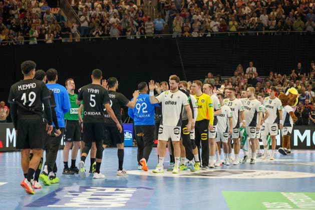 Dortmund, Germany 19 March 2026 Handball international friendly match Germany vs Egypt In the picture The players of the Egyptian and German national handball teams high-five each other after the match in Dortmund Copyright: HMBxMedia MadeleinexFantini