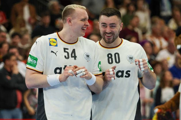 Dortmund, Germany 19 March 2026 Handball international friendly match Germany vs Egypt In the picture from left Justus Fischer Germany and Jannik Kohlbacher Germany laughing Copyright: HMBxMedia MadeleinexFantini