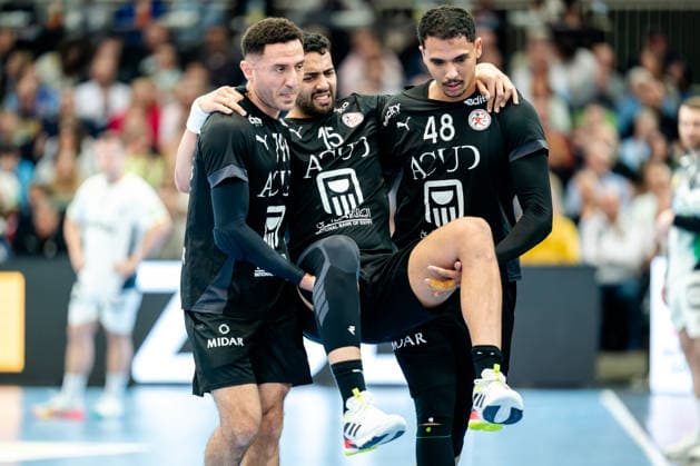 Dortmund 19 03 2026, Handball, Men, International match, Germany Egypt Ahmed Hesham Egypt, 15 is carried off the field injured by Ahmed Nafea Egypt, 79 and Mohab Saeid Egypt, 48 Dortmund Westfalenhalle NRW Germany