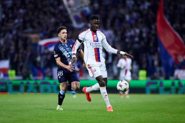 Olympique Lyonnais v Real Club Celta - Europa League DECINES-CHARPIEU, FRANCE - MARCH 19: Moussa Niakhate of Olympique Lyonnais competes for the ball with Pablo Duran during the UEFA Europa League 2025 26 Round of 16 Second Leg match between Olympique Lyonnais and Real Club Celta at OL Stadium on March 19, 2026 in Decines-Charpieu, France. DECINES-CHARPIEU OL Stadium Spain Copyright: xDiegoxSimonx