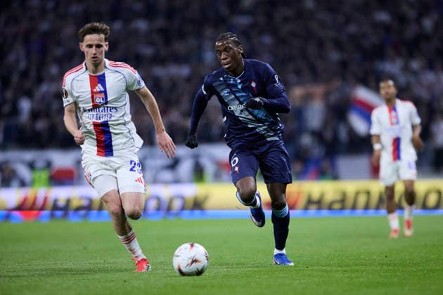 Olympique Lyonnais v Real Club Celta - Europa League DECINES-CHARPIEU, FRANCE - MARCH 19: Illaix Moriba of Celta de Vigo competes for the ball with Tyler Morton of Olympique Lyonnais during the UEFA Europa League 2025 26 Round of 16 Second Leg match between Olympique Lyonnais and Real Club Celta at OL Stadium on March 19, 2026 in Decines-Charpieu, France. DECINES-CHARPIEU OL Stadium Spain Copyright: xDiegoxSimonx