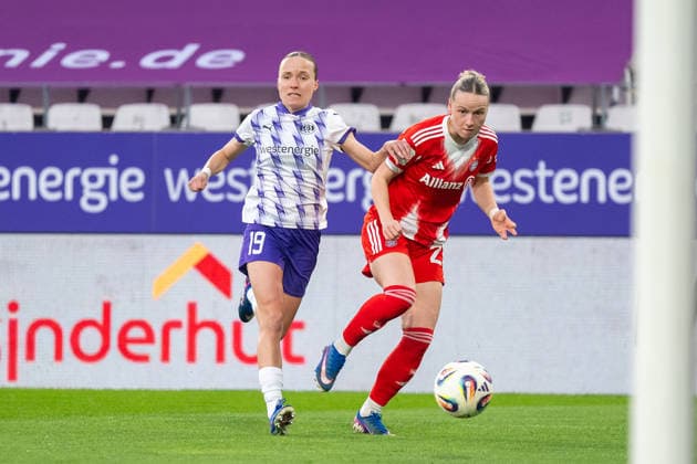Duel between Beke Sterner SGS Essen, 19 and Franziska Kett FC Bayern Muenchen, 20 SGS Essen vs FC Bayern Muenchen, Football, Womens Bundesliga, Matchday 21, Season 2025 2026, 20 03 2026 DFL DFB Regulations prohibit any use of Photographs as image sequences and or Quasivideo SGS Essen vs FC Bayern Muenchen, Football, Womens Bundesliga, Matchday 21, Season 2025 2026, 20 03 2026 Essen Copyright: xEibner-Pressefoto ThomasxHaeslerx EP_THR