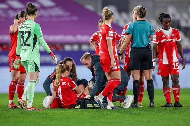 20 03 2026, Football, 1 Womens Bundesliga, SGS Essen FC Bayern München, Stadion Hafenstraße, Google Pixel Frauenbundesliga, 21 Spieltag, Saison 2025 2026 Glodis Viggosdottir FC Bayern Muenchen 04 must receive medical treatment for head injury Kinn DFB regulations prohibit any use of photographs as image sequences and or quasi video Nordrhein Westfalen Germany