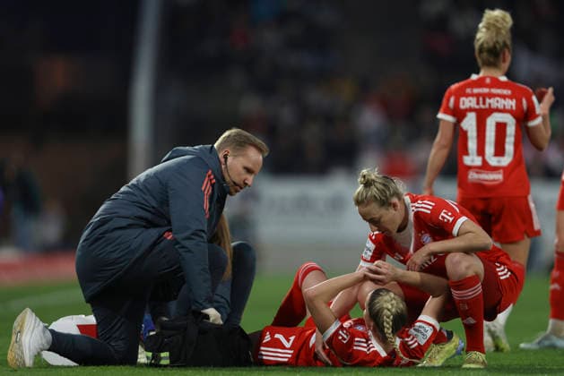 Giulia Gwinn FC Bayern Munich is injured on the ground during the Woman Bundesliga match between SGS Essen and Bayern Munich at Stadion an der Hafenstraße on March 20 in Essen, Germany, Germany Photo by Oliver Kaelke DeFodi Images Giulia Gwinn FC Bayern München injured on the ground during the Woman Bundesliga match between SGS Essen and Bayern München at Stadion an der Hafenstraße on March 20, 2026 in Cologne, Germany Photo by Oliver Kaelke DeFodi Images DFL regulations prohibit any use of photographs as image sequences and or quasi video Photo by Oliver Kaelke DeFodi Images