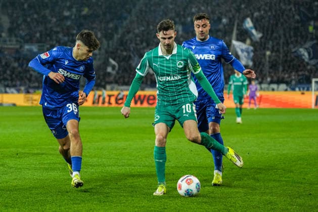 2 Bundesliga, Karlsruher SC vs. SpVgg Greuther Fürth, 20 03 2026 One-on-one fight between Rafael Pinto Pedrosa Karlsruher SC, 36 and Branimir Hrgota SpVgg Greuther Fürth, 10 2 Bundesliga, Karlsruher SC vs. SpVgg Greuther Fürth, BBBank Wildpark Karlsruhe, 20 03 2026 DFB DFL REGULATES PROHIBIT ANY USE OF PHOTOGRAPHS AS IMAGE SEQUENCES AND OR QUASI VIDEO Copyright: xBEAUTIFULxSPORTS Boscox