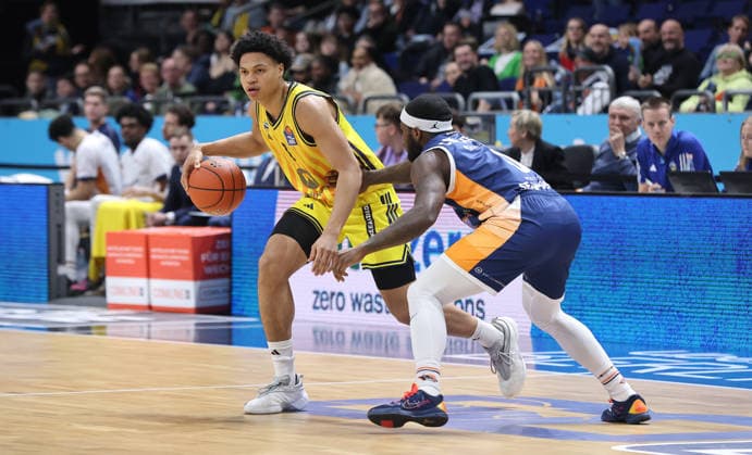 Jack Kayil on the ball, TJ Crockett duel Game scene Action Sport Basketball BBL Bundesliga Men 25 Matchday Season 2025 2026 20 03 2026 ALBA Berlin vs Rostock Seawolves