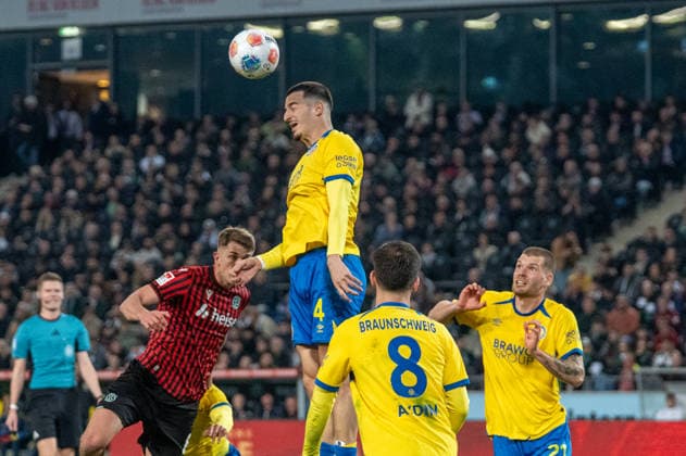 Germany Soccer 2 Bundesliga, Matchday 27 2025 2026, Hannover 96 Eintracht Braunschweig on 20 03 in Hannover Heinz von Heiden Arena Andi Hoti Eintracht Braunschweig 4 Maik Nawrocki Hannover 96 6 Mehmet Aydin Eintracht Braunschweig 8 Kevin Ehlers Eintracht Braunschweig 21 Copyright: xSvenxHeidmannx