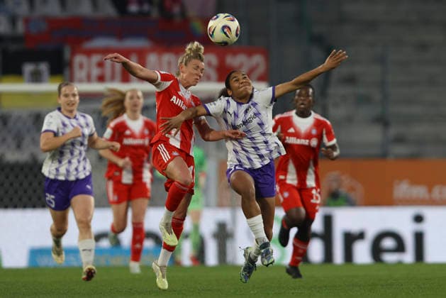 Linda Dallmann FC Bayern München and Ella Touon SGS Essen battle for the ball during the Woman Bundesliga match between SGS Essen and Bayern München at Stadion an der Hafenstraße on March 20 in Essen, Germany, Germany Photo by Oliver Kaelke DeFodi Images Linda Dallmann FC Bayern München and Ella Touon SGS Essen battle for the ball during the Woman Bundesliga match between SGS Essen and Bayern München at Stadion an der Hafenstraße on March 20, 2026 in Cologne, Germany Photo by Oliver Kaelke DeFodi Images DFL regulations prohibit any use of photographs as image sequences and or quasi video Photo by Oliver Kaelke DeFodi Images