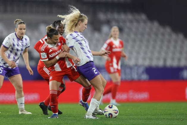 Arianna Caruso FC Bayern München and Julie Terlinden SGS Essen battle for the ball during the Woman Bundesliga match between SGS Essen and Bayern München, Stadion an der Hafenstraße on March 20 in Essen, Germany, Germany Photo by Oliver Kaelke DeFodi Images Arianna Caruso FC Bayern München and Julie Terlinden SGS Essen battle for the ball during the Woman Bundesliga match between SGS Essen and Bayern München at Stadion an der Hafenstraße on March 20, 2026 in Cologne, Germany Photo by Oliver Kaelke DeFodi Images DFL regulations prohibit any use of photographs as image sequences and or quasi video Photo by Oliver Kaelke DeFodi Images