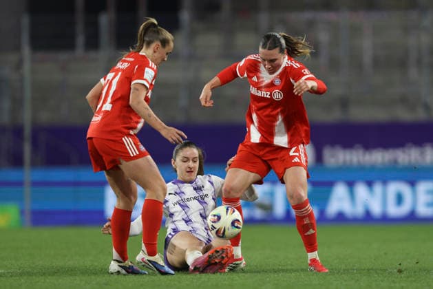 Georgia Stanway FC Bayern Munich , Laureta Elmazi SGS Essen and Vanessa Gilles FC Bayern Munich battle for the ball during the Woman Bundesliga match between SGS Essen and Bayern Munich at Stadion an der Hafenstraße on March 20 in Essen, Germany Photo by Oliver Kaelke DeFodi Images Georgia Stanway FC Bayern Munich , Laureta Elmazi SGS Essen and Vanessa Gilles FC Bayern München battle for the ball during the Woman Bundesliga match between SGS Essen and Bayern München at Stadion an der Hafenstraße on March 20, 2026 in Cologne, Germany Photo by Oliver Kaelke DeFodi Images DFL regulations prohibit any use of photographs as image sequences and or quasi video Photo by Oliver Kaelke DeFodi Images