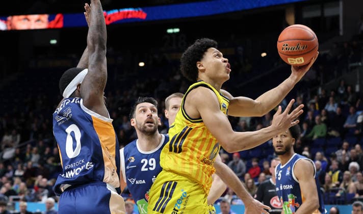 TJ Crockett, Owen Klassen, Jack Kayil on the ball duel Game scene Action Sport Basketball BBL Bundesliga Men 25 Matchday Season 2025 2026 20 03 2026 ALBA Berlin vs Rostock Seawolves