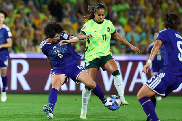 Mary Fowler of Australia contests the ball with Toko Koga of Japan during the AFC Womens Asian Cup 2026 Final match between Japan Women and Australia Women at Stadium Australia, Sydney, Australia on 21 March 2026. Copyright: xPeterxDovganx 44690020