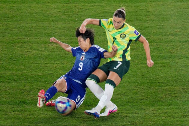 March 21, 2026, Sydney, Nsw, Australia: STEPHANIE CATLEY (7) of Australia and RIKO UEKI (9) of Japan compete for the ball during the final of the AFC Women s Asian Cup between Japan and Australia at Stadium Australia in Sydney, Australia. Soccer 2026: AFC Women s Asian Cup Final  - ZUMAl303 20260321_aaf_l303_014 Copyright: xSydneyxLowx