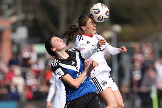 FRANKFURT AM MAIN, GERMANY 21 MARCH 2026 Eintracht Frankfurt Women v HSV Women, 1 Womens Bundesliga, Stadion am Brentanobad v l , Lotta Wrede Hamburger SV , Ereleta Memeti Eintracht Frankfurt , header, header duel, aerial duel Copyright: JoaquimxFerreira