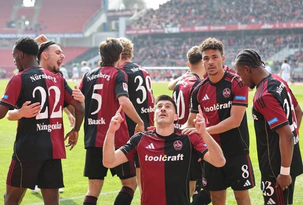 21 03 2026 Soccer Season 2025 2026 2 Soccer Bundesliga 27 Matchday 1 FC Nürnberg FCN Club 1 FC Kaiserslautern FCK Rote Roten Teufel Sportfoto Zink DaMa xdaxmax DFL regulations prohibit any use of photographs as image sequences and or quasi video only for editorial use Jubel Freude Torjubel nach Tor zum 1 0 Luka Lochoshvili 24, 1 FC Nürnberg FCN und Mannschaft Team jubelt freut sich Torschütze Luka Lochoshvili 24, 1 FC Nürnberg FCN