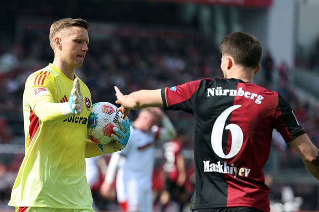 21 03 2026, xrekx, Fußball 2 Bundesliga, 1 FC Nuernberg 1 FC Kaiserslautern v l Jan Reichert 1 FC Nuernberg Adam Markhiev 1 FC Nuernberg lacht, lächelt, positiv, zufrieden, laughs, smiles, positive, satisfied DFL DFB REGULATIONS PROHIBIT ANY USE OF PHOTOGRAPHS as IMAGE SEQUENCES and or QUASI VIDEO Nuernberg