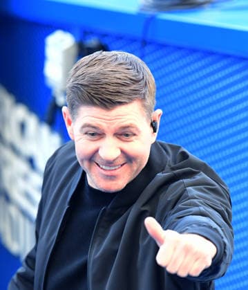 Brighton and Hove Albion v Liverpool, Premier League Ex Liverpool player Steven Gerrard gives the thumbs up to a fan during the Premier League match between Brighton and Hove Albion and Liverpool at the American Express Stadium, Brighton and Hove, UK on 21 March 2026. Brighton and Hove American Express Stadium East Sussex UK Editorial use only DataCo restrictions apply See www.football-dataco.com , Copyright: xJeffxMoodx PSI-23949-0005