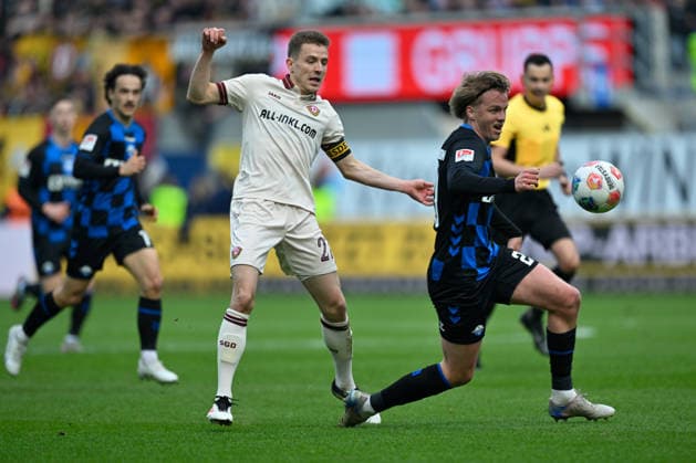 Paderborn, Home Deluxe Arena, 21 03 26, GER, Men, 2 Bundesliga, Season 2025 2026, SC Paderborn 07 Dynamo Dresden Picture from left in duel Niklas HAUPTMANN Dresden and Felix GOETZE Paderborn DFL regulations prohibit any use of photographs as image sequences and or quasi video NRW Germany