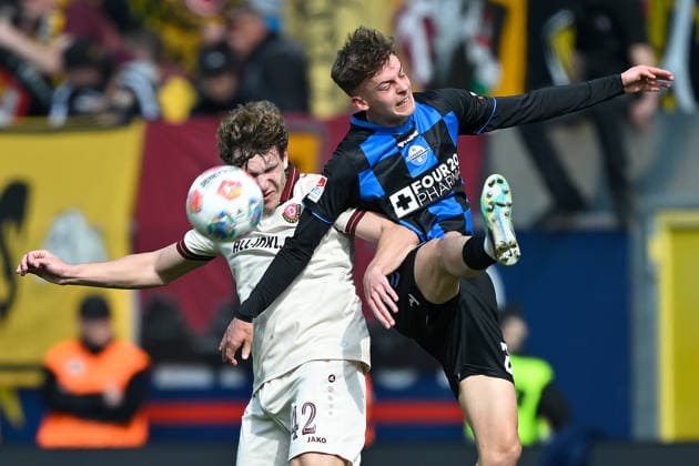 Paderborn, Home Deluxe Arena, 21 03 26, GER, Men, 2 Bundesliga, Saison 2025 2026, SC Paderborn 07 Dynamo Dresden Picture from left in duel Friedrich MUELLER Dresden and Ruben MUELLER Paderborn DFL regulations prohibit any use of photographs as image sequences and or quasi video NRW Germany