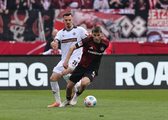 21 03 2026 Soccer Season 2025 2026 2 Soccer Bundesliga 27 Matchday 1 FC Nürnberg FCN Club 1 FC Kaiserslautern FCK Rote Roten Teufel Sportfoto Zink DaMa xdaxmax DFL regulations prohibit any use of photographs as image sequences and or quasi video only for editorial use Mergim Berisha 20, 1 FC Kaiserslautern FCK Adam Markhiev 6, 1 FC Nürnberg FCN