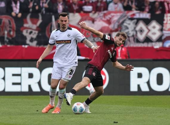 21 03 2026 Soccer Season 2025 2026 2 Soccer Bundesliga 27 Matchday 1 FC Nürnberg FCN Club 1 FC Kaiserslautern FCK Rote Roten Teufel Sportfoto Zink DaMa xdaxmax DFL regulations prohibit any use of photographs as image sequences and or quasi video only for editorial use Mergim Berisha 20, 1 FC Kaiserslautern FCK Adam Markhiev 6, 1 FC Nürnberg FCN